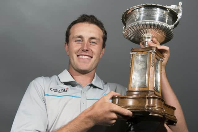 Chris Robb with the Scottish Amateur Championship trophy. Picture: Kenny Smith