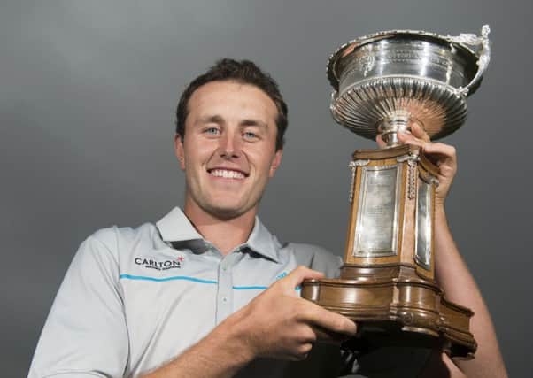 Chris Robb with the Scottish Amateur Championship trophy. Picture: Kenny Smith