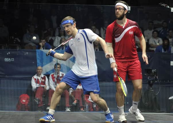 Alan Clyne plays a shot in the Bronze medal game in the Glasgow 2014 squash tournament. Picture: Ian Rutherford