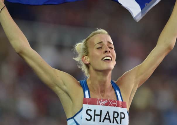 Lynsey Sharp celebrates her silver medal. Picture: Ian Rutherford