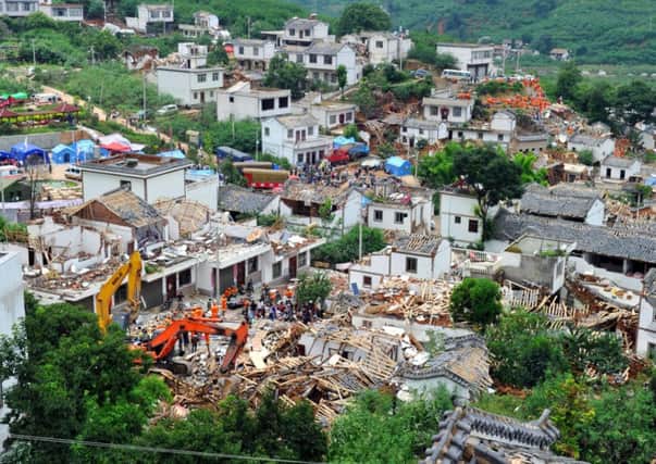 Collapsed houses in Ludian County of Zhaotong City in southwest China's Yunnan Province following the earthquake. Picture: AP