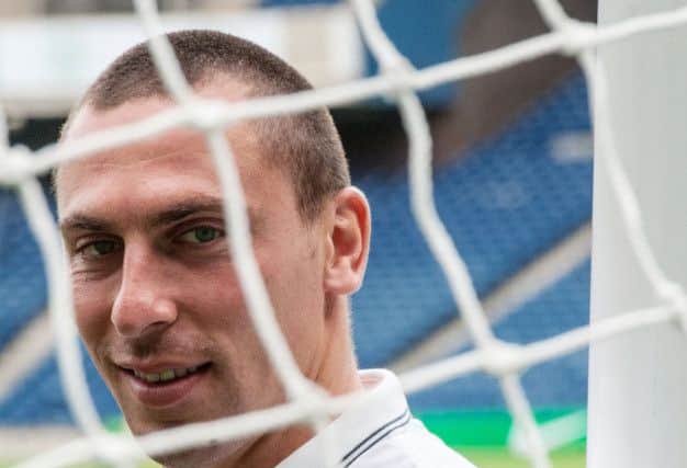 Scott Brown, who is still injured, believes Celtic can get past Legia Warsaw tomorrow. Picture: Phil Wilkinson