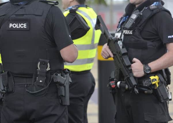 A small number of officers in Scotland were given a standing authority to carry guns following the merger of the forces. Picture: Ian Rutherford