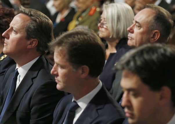 Messers Cameron, Miliband and Clegg offer unspecified powers over fiscal responsibility and social security. Picture: PA