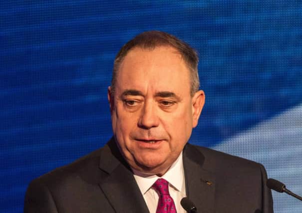 First Minister Alex Salmond makes a point during the debate. Picture: PA