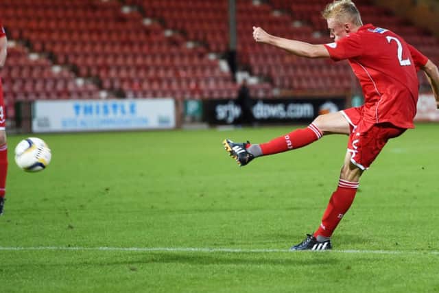 Dunfermline's Ross Millen fires it home to give his side the lead. Picture: SNS