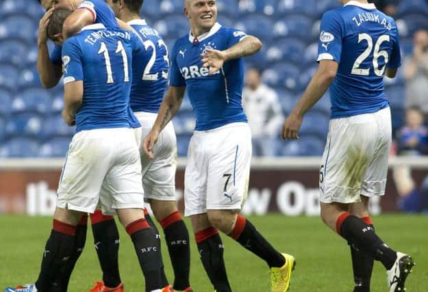 Nicky Law celebrates scoring the winning goal against Hibs. Picture: PA