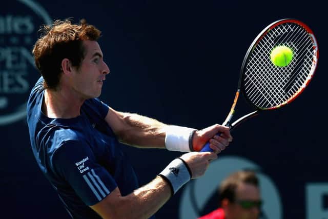 Andy Murray returns a shot during his 6-2, 6-2 win over Aussie Nick Kyrgios. Picture: Ronald Martinez/Getty