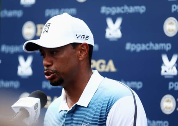 Tiger Woods speaks with the media after his practice round prior to the start of the 96th PGA Championship at Valhalla Golf Club. Picture: Getty