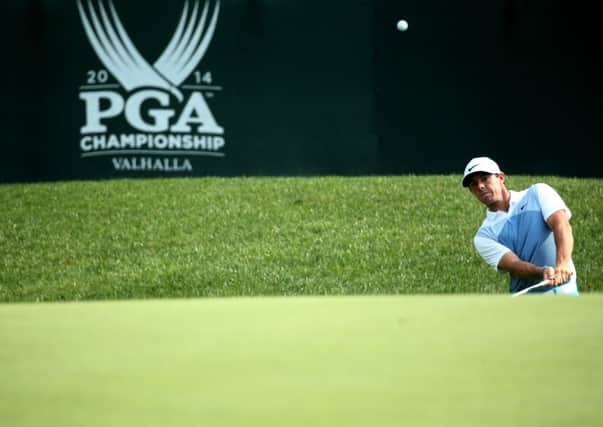 Rory McIlroy of Northern Ireland chips onto a green during a practice round prior to the start of the 96th PGA Championship at Valhalla. Picture: Getty