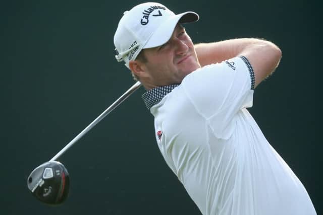 Marc Warren of Scotland hits a tee shot during a practice round prior to the start of the 96th PGA Championship at Valhalla. Picture: Getty