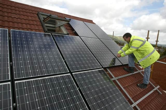 Installing solar panels is one such means of saving energy. Picture: PA
