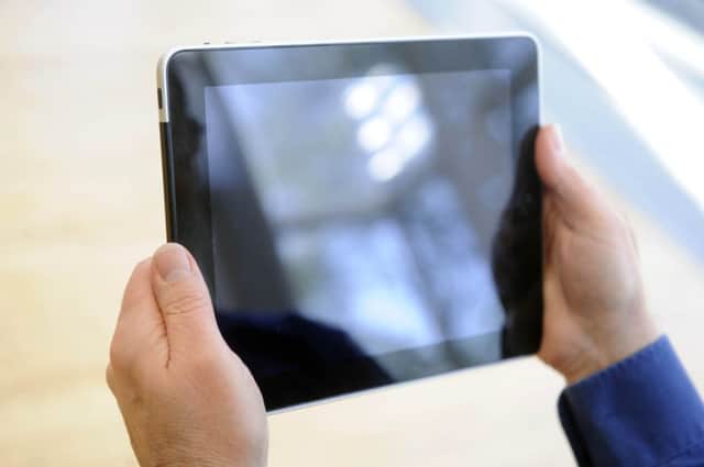 42 per cent of households also own a tablet device or iPad. Picture: Greg Macvean