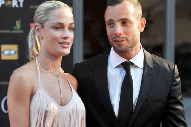 Pistorius faces 25 to life if found guilty of murdering girlfriend Reeva Steenkamp (left). Picture: AFP