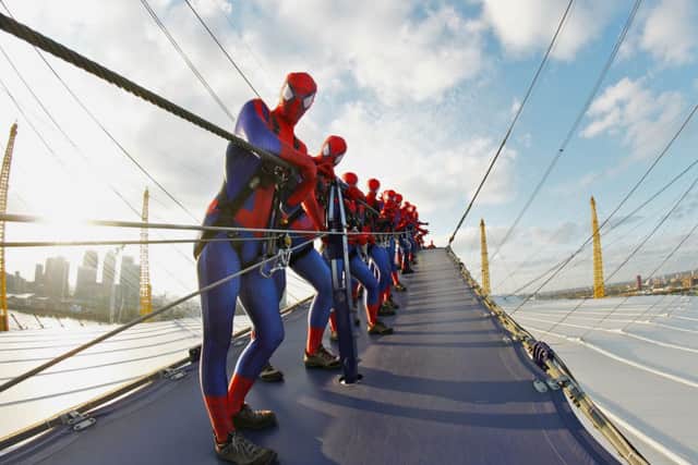 SpiderMan fans donned Morph suits to publicise the latest film in the blockbuster series, standing on top of the O2 arena in central London Picture: Contributed