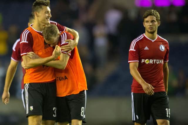 Michal Zyro (left) and Legia Warsaw team-mate Ondrej Duda celebrate at full-time. Picture: SNS
