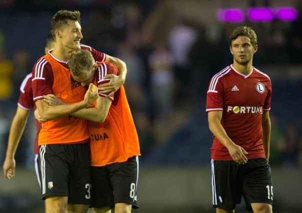 Michal Zyro (left) and Legia Warsaw team-mate Ondrej Duda celebrate at full-time. Picture: SNS