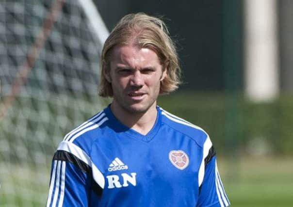 Hearts head coach Robbie Neilson is still adapting to the role. Photograph: SNS