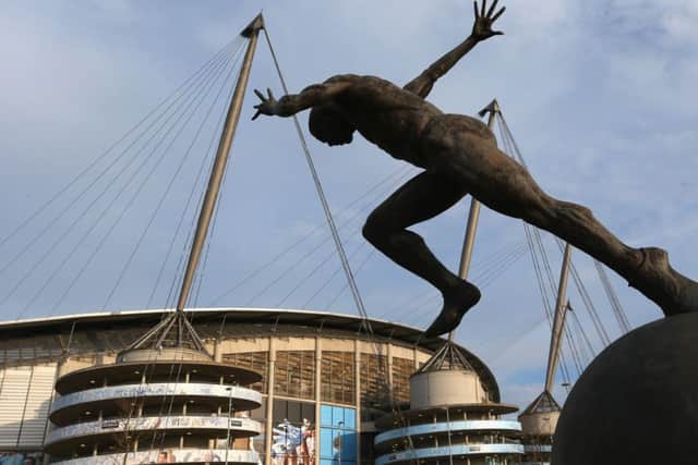 A statue of a sprinter at the Etihad Stadium, now used by Manchester City and which stands as an enduring legacy of the 2002 Commonwealth Games. Photograph: Alex Livesey/Getty