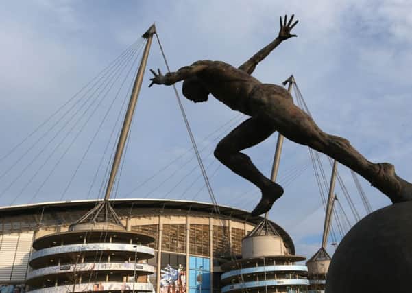 A statue of a sprinter at the Etihad Stadium, now used by Manchester City and which stands as an enduring legacy of the 2002 Commonwealth Games. Photograph: Alex Livesey/Getty