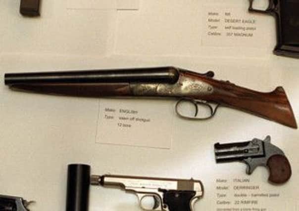 A sawn off shotgun like the one pictured was found in the Aberdeen man's home. Picture: PA