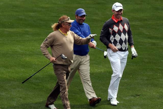 Stephen Gallacher with Miguel Angel Jimenez and Jose Maria Olazabal  walking down a fairway together. Picture: Getty