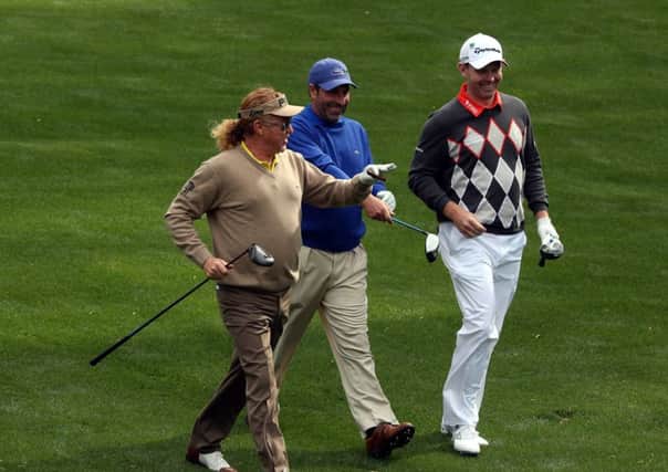 Stephen Gallacher with Miguel Angel Jimenez and Jose Maria Olazabal  walking down a fairway together. Picture: Getty