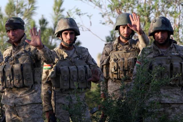 Fighting between Iraqi Kurdish Peshmerga fighters (picutred) and the IS have forced Petroceltic to suspend operations. Picture: Getty