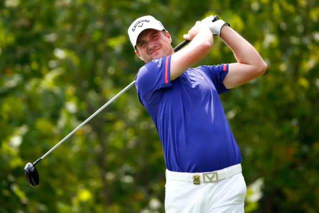 Marc Warren hits a shot during the final round of the 96th PGA Championship at Valhalla. Picture: Getty