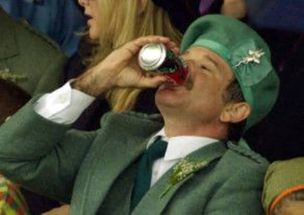 Comedian Robin Williams in full Highland dress at the Lonach Highland Games in Strathdon. Picture: PA