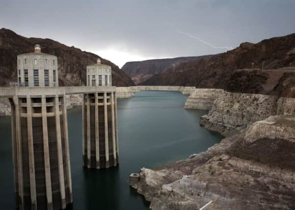 Lake Mead: the tidemark shows the previous and current high-water levels  the lake has shrunk to its lowest point since it was first filled in the 1930s  Picture: AP