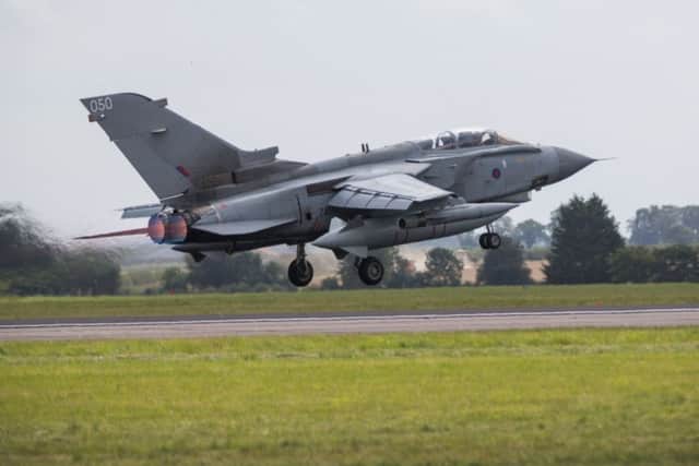 A Tornado GR4 equipped with the Litening III pod taking off from RAF Marham. Picture: PA