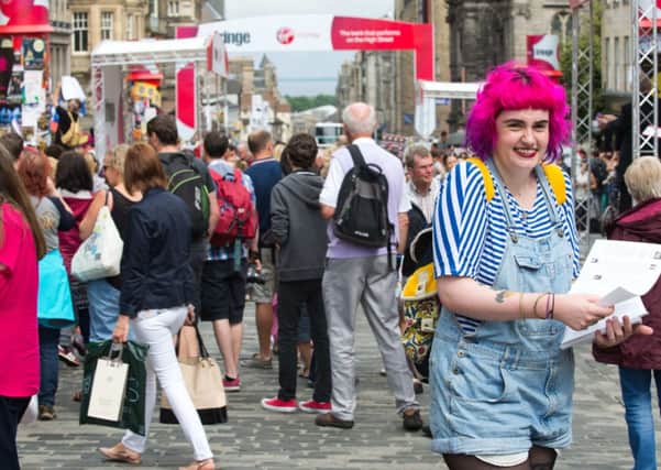 Leafleters and spectators on Edinburgh's Royal Mile. Picture: Alex Hewitt