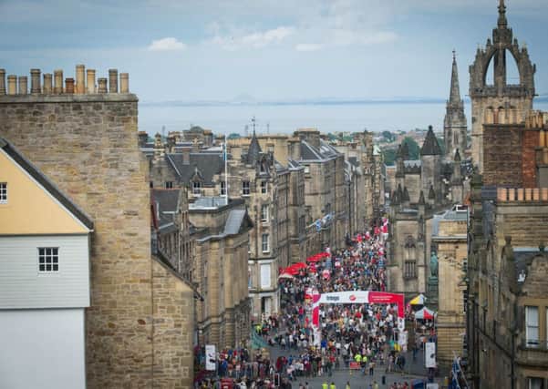 People gather on Edinburgh's Royal Mile during the Edinburgh Festival. Picture: Alex Hewitt/Camera Obscura