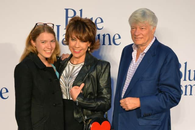 Australian author Kathy Lette (C) poses with her husband Geoffrey Robertson (R) and their daughter Georgie. Picture: Getty