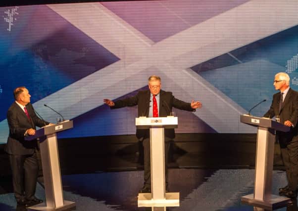 Alex Salmond, Bernard Ponsonby and Alistair Darling on the inaugural television debate on independence, which was screened on STV. Picture: Peter Devlin