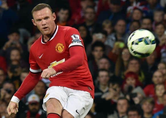 Wayne Rooney wears the captain's armband during a friendly against Valencia. Picture: Getty