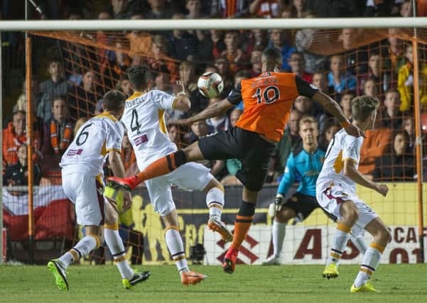 Dundee Utd new boy Mario Bilate (19) sees his wonder strike find the net to give his side the win. Picture; SNS