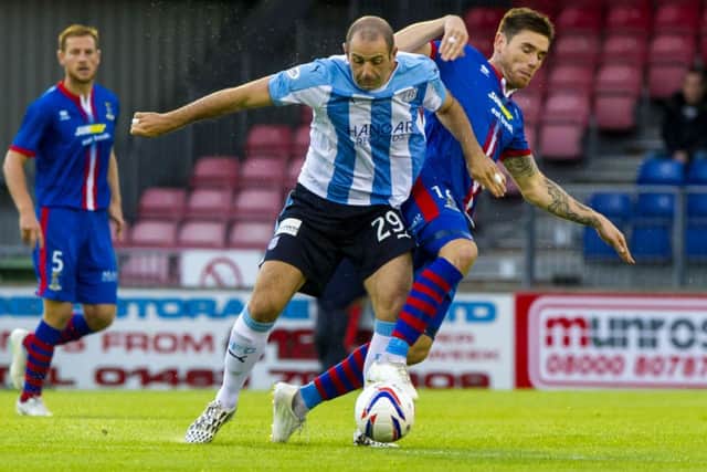 Dundee's Gary Harkins (left) and Greg Tansey battle for possession. Picture: SNS