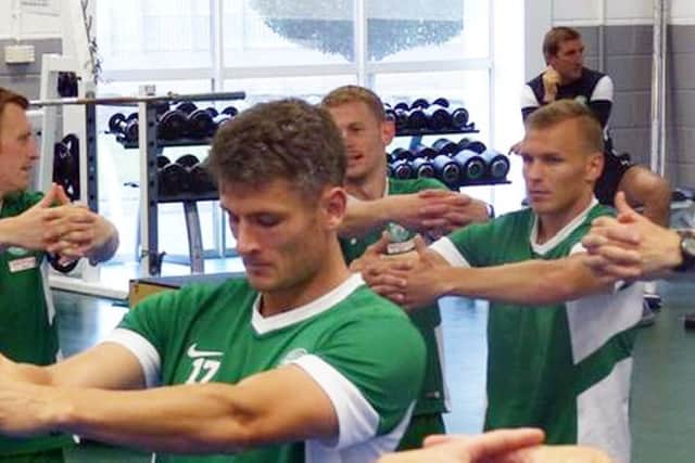 Albert Taar pictured far right, trains with Hibs at their East Mains training centre. Picture: Hibernian FC/Facebook