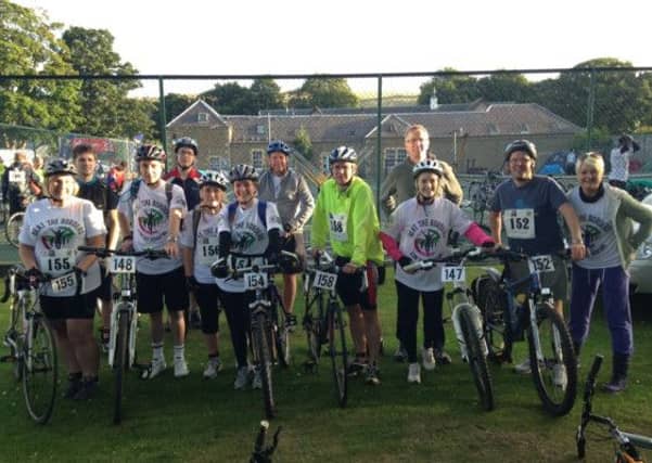 Beat the Borders Pagan Osborne Team, left, which completed the 68-mile cycle and run to raise cash for CHAS in 2013. Picture: Contributed