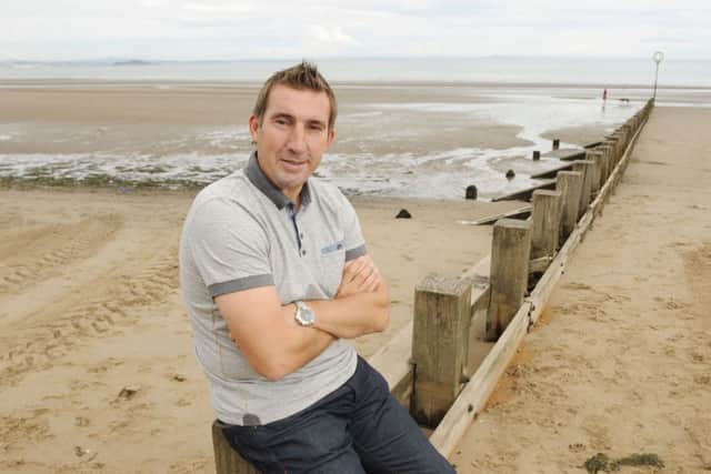 Hibs manager Alan Stubbs relaxes on the seafront at Portobello. Picture: Greg MacVean