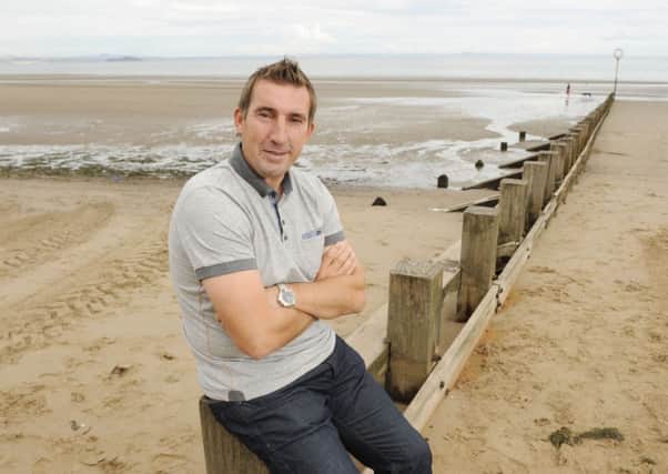 Hibs manager Alan Stubbs relaxes on the seafront at Portobello. Picture: Greg MacVean