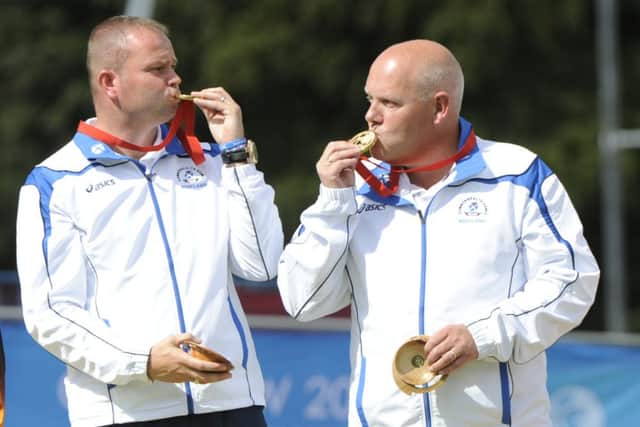 Scotlands Paul Foster, left, and Alex Marshall, right, won gold at the Commonwealth Games. Photograph: Andrew OBrien