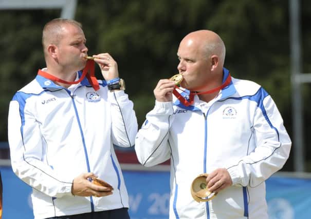 Scotlands Paul Foster, left, and Alex Marshall, right, won gold at the Commonwealth Games. Photograph: Andrew OBrien