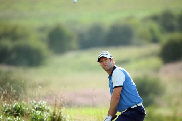 Bradley Dredge chips at the 10th hole at the start of a superb homeward run in Aalborg. Picture: Getty