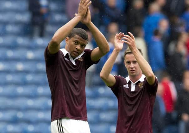 Danger man Osman Sow celebrates after scoring the winner for Hearts against Rangers. Photograph: Rob Caey/SNS