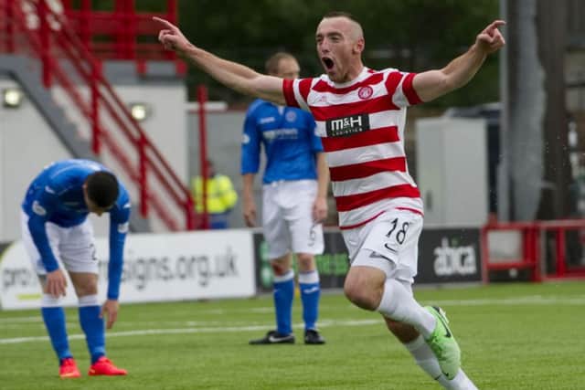 Hamilton's Darian MacKinnon celebrates after opening the scoring. Picture: Gary Williamson
