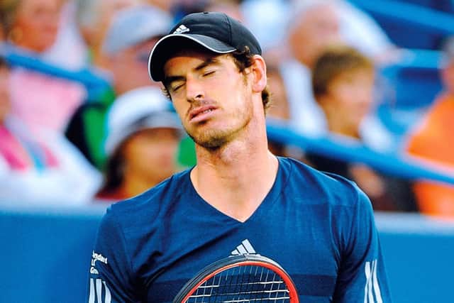 Murray shows disappointment during his loss to Roger Federer Photograph: Getty Images