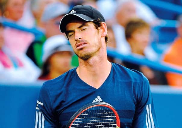 Murray shows disappointment during his loss to Roger Federer Photograph: Getty Images